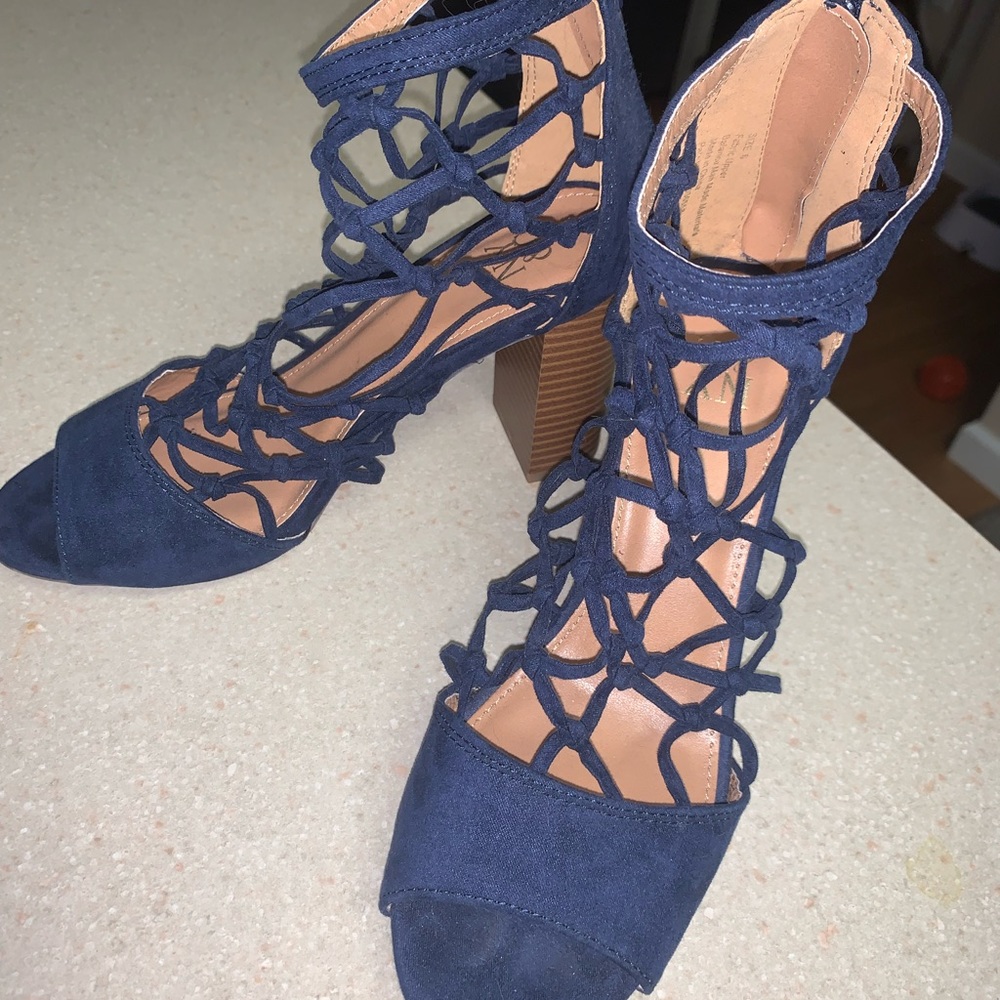 Women’s Bootie style heel. navy blue. worn once